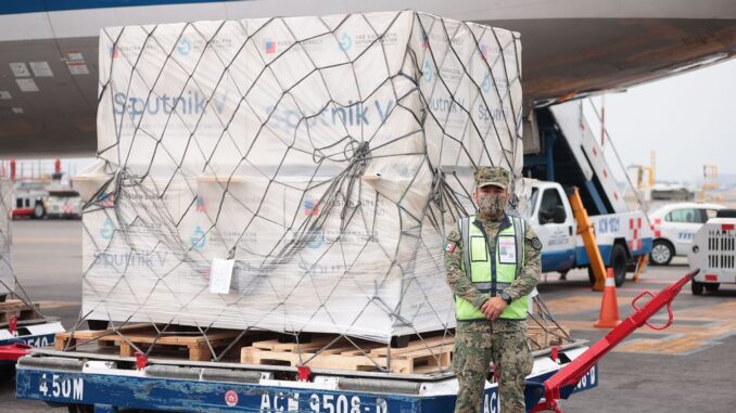 A shipment of the Russian Sputnik V vaccine arrives at the Benito Juárez Airport in Mexico City on April 29. Many Latin Americans received this vaccine, which is not approved in several countries. (Hector Vivas/Getty Images)