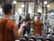 Gabriel Carvalho works out without a face mask a Fitness SF gym on October 15, 2021 in San Francisco, California.  (Photo by Justin Sullivan/Getty Images)