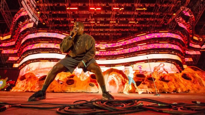 feat_7ee82499-801a-4077-98ff-891a9333b4b7 Kanye West and Kid Cudi perform during 2019 Coachella Valley Music And Arts Festival. Since his antisemitic hate rants, West has lost numerous business deals, including Adidas. But his memorabilia was just included in a rock ‘n’ roll auction by Julien's Auctions. TIMOTHY NORRIS/GETTY IMAGES FOR COACHELLA
