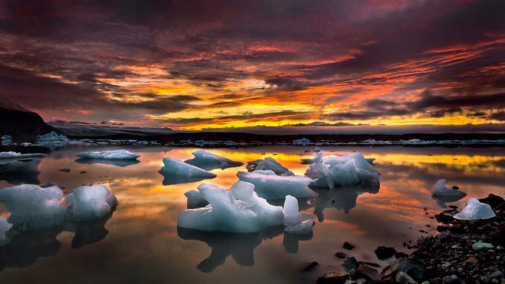 SLEEP IN A GLASS IGLOO FROZEN INTO A GLACIAL LAGOON ON A PRIVATE