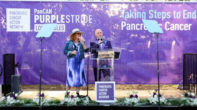 IN FILE- Pam Pruitt-McGeary and Daryl Evans appear on stage at PanCAN PurpleStride: The Ultimate Event to End Pancreatic Cancer at the Los Angeles Zoo on April 30, 2022 in Los Angeles, California. DAVID LIVINGSTON/GETTY IMAGES