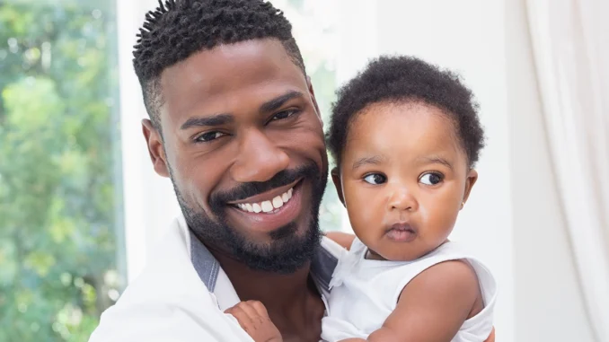 dad and baby AdobeStock_86998217 copy